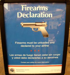 You have to go to the ticket counter and declare your gun.